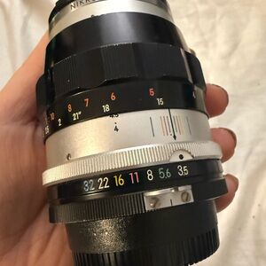 Nikon Black and Silver Manual Focus Lens